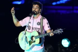 FORT LAUDERDALE, FLORIDA - JULY 16: Colombian singer Camilo performs during "The Unveil" introducing Lionel Messi hosted by Inter Miami CF at DRV PNK Stadium on July 16, 2023 in Fort Lauderdale, Florida.   Mike Ehrmann/Getty Images/AFP (Photo by Mike Ehrmann / GETTY IMAGES NORTH AMERICA / Getty Images via AFP)