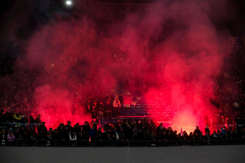 DIEGO ARMANDO MARADONA STADIUM, NAPOLI, CAMPANIA, ITALY - 2023/04/02: SSC Napoli supporters burn flares during the Serie A football match between SSC Napoli and  AC Milan.