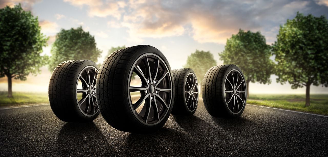Car tires on summer country road