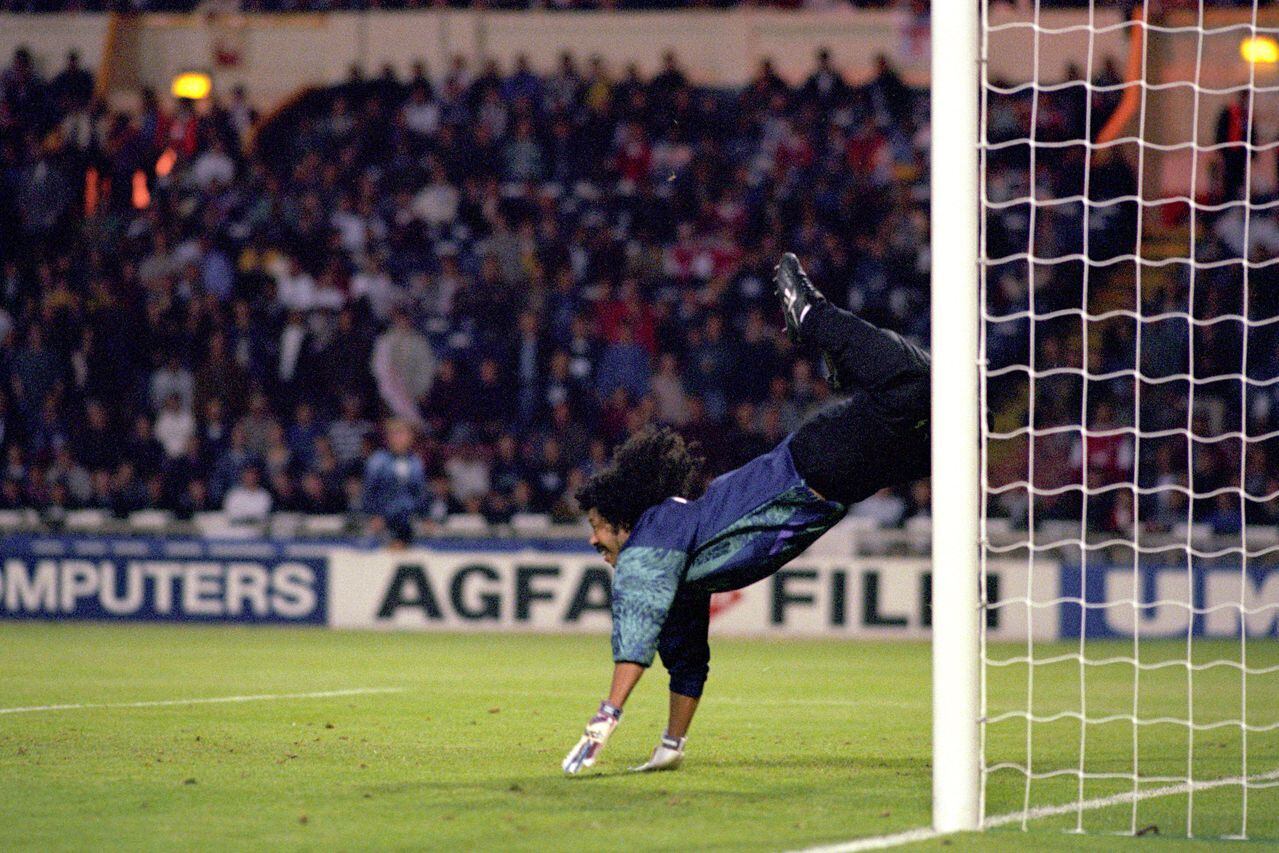 Rene Higuita, Colombia, clears the ball with a backward overhead kick against England.  (Photo by EMPICS Sport - PA Images via Getty Images)