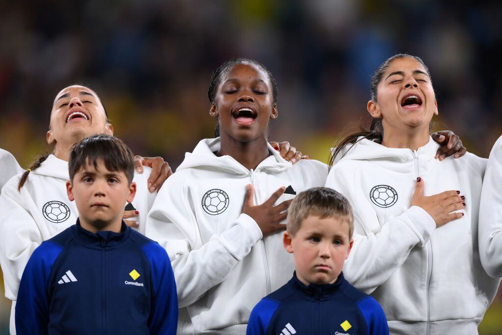SYDNEY, AUSTRALIA - JULY 30: Linda Caicedo of Colombia (C) sings the national anthem prior to the FIFA Women's World Cup Australia & New Zealand 2023 Group H match between Germany and Colombia at Sydney Football Stadium on July 30, 2023 in Sydney, Australia. (Photo by Justin Setterfield/Getty Images)