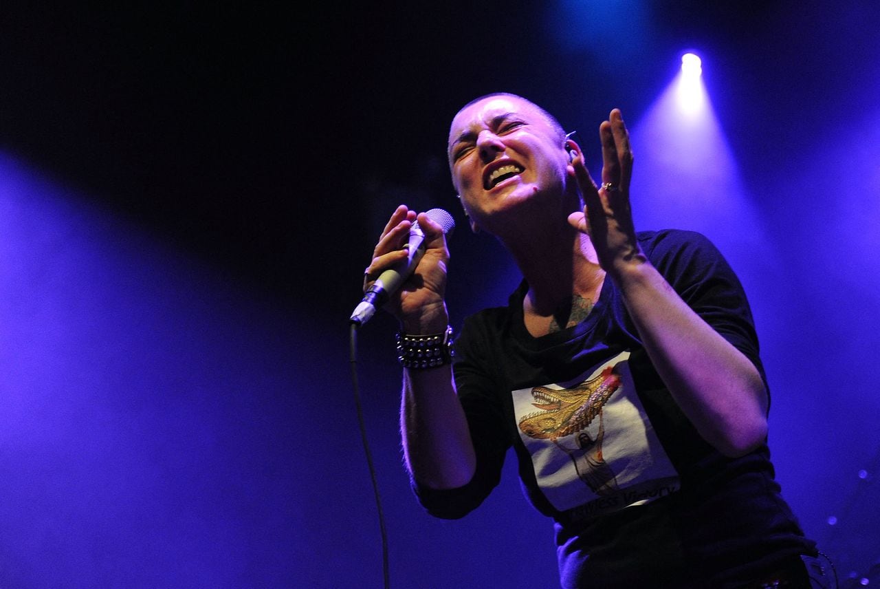 (FILES) Irish singer Sinead O'Connor performs at the Highline Ballroom in New York City on February 23, 2012. Irish pop singer Sinead O'Connor, who shot to fame in the 1990s, has died at the age of 56, Irish media reported on July 26, 2023. In a statement her family said it was with "great sadness that we announce the passing of our beloved Sinead. Her family and friends are devastated and have requested privacy at this very difficult time," Irish national broadcaster RTE reported. (Photo by Jason Kempin / GETTY IMAGES NORTH AMERICA / AFP)