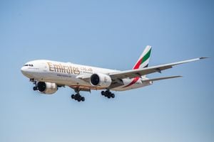BARCELONA, CATALONIA, SPAIN - 2022/05/31: Emirates Airline, Boeing 777-300ER airplane is seen landing at El Prat Airport. (Photo by Thiago Prudencio/SOPA Images/LightRocket via Getty Images)