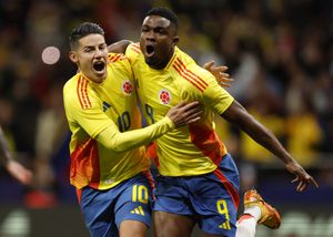 Colombia's forward #09 Jhon Cordoba (R) celebrates with Colombia's midfielder #10 James Rodriguez scoring his team's first goal during the international friendly football match between Romania and Colombia at the Metropolitano stadium in Madrid on March 26, 2024. (Photo by OSCAR DEL POZO / AFP)