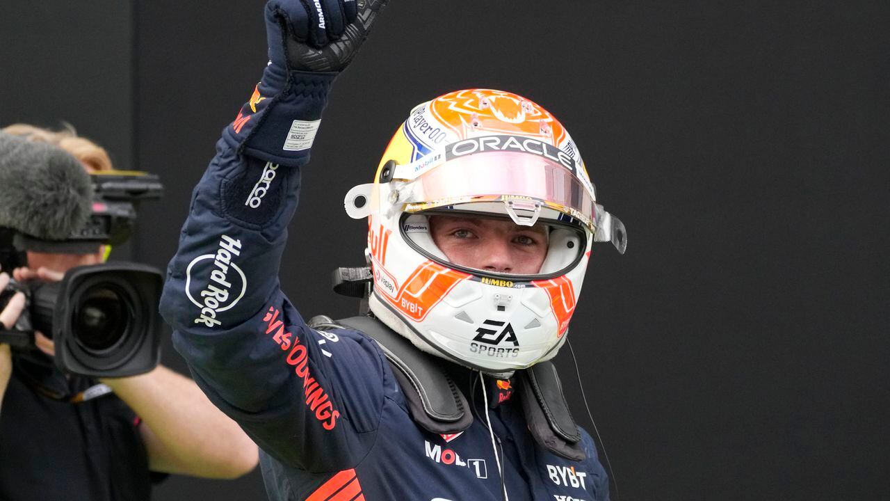 Red Bull driver Max Verstappen of the Netherlands gestures to the fans after clocking the fastest time in the qualifying session ahead of Sunday's Formula One Austrian Grand Prix auto race, at the Red Bull Ring racetrack, in Spielberg, Austria, Friday, June 30, 2023. (AP Photo/Darko Bandic, Pool)
