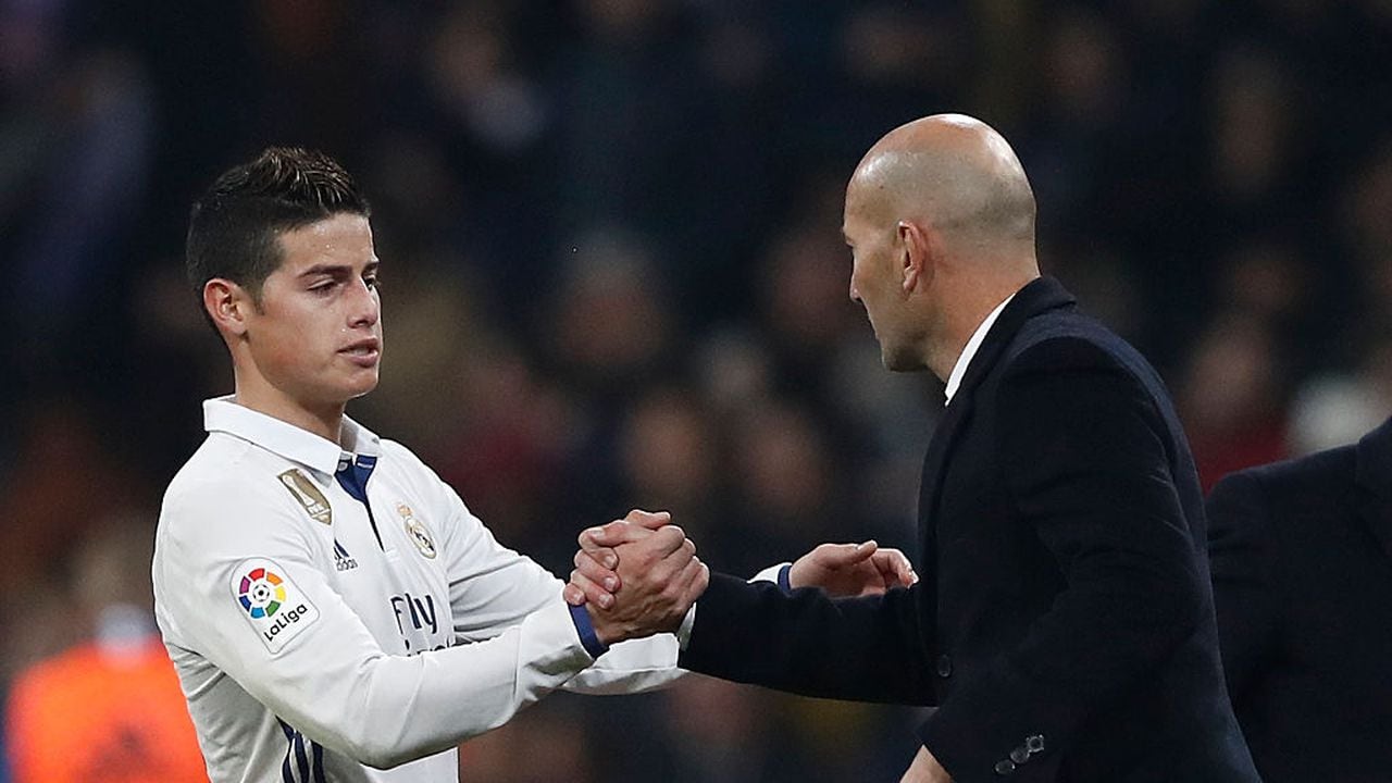 MADRID, SPAIN - JANUARY 04:  Headcoach Zinedine ZIdane and James Rodriguez of Real Madrid celebrate after scoring during the Copa del Rey round of 16 first leg match between Real Madrid CF and Sevilla at Estadio Santiago Bernabeu on January 4, 2017 in Madrid, Spain.  (Photo by Helios de la Rubia/Real Madrid via Getty Images)