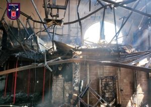 This handout photo made available by Bomberos de Murcia on October 1, 2023, shows the burned interior of a nightclub where a fire at least killed thirteen people in Murcia, on October 1, 2023. At least 13 people were killed in a fire in a Spanish nightclub on October 1, 2023 morning, officials said, with fears the toll could still rise as rescue workers sift through the debris. The fire appears to have broken out in a building housing the "Teatre" and "Fonda Milagros" clubs in the city of Murcia in southeastern Spain. (Photo by Handout / Bomberos de Murcia / AFP) / RESTRICTED TO EDITORIAL USE - MANDATORY CREDIT "AFP PHOTO / BOMBEROS DE MURCIA  " - NO MARKETING NO ADVERTISING CAMPAIGNS - DISTRIBUTED AS A SERVICE TO CLIENTS