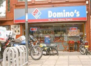 Domino's Pizza, una de las franquicias de Alsea. 
