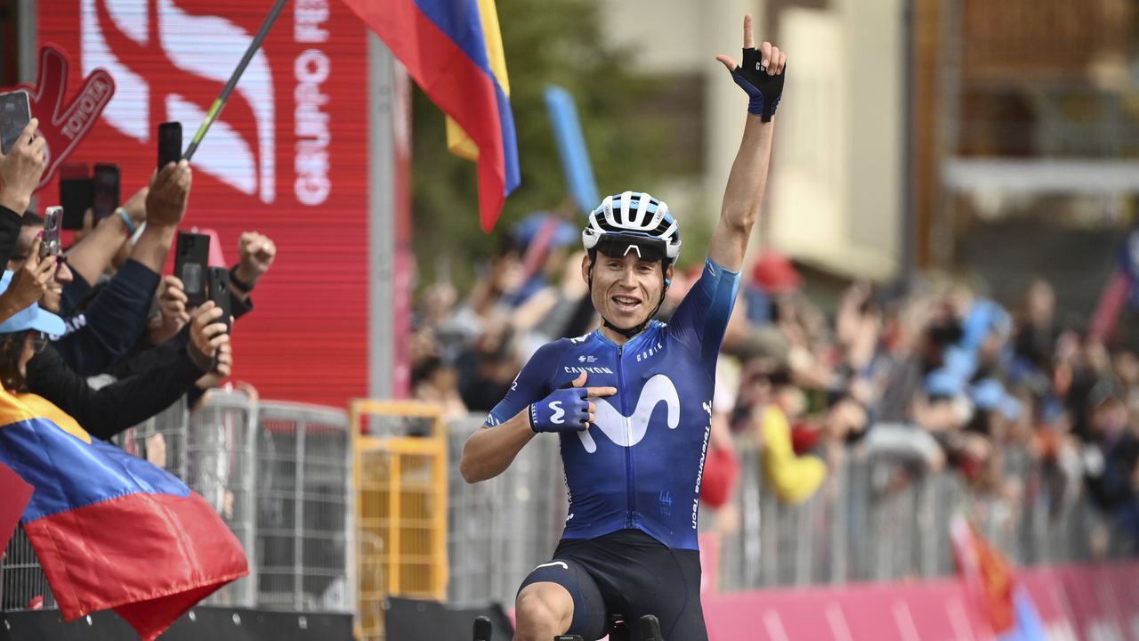 Colombia's Einer Rubio Reyes celebrates winning the 13rd stage of the Giro D'Italia, tour of Italy cycling race, from Borgofranco D'Ivrea to Crans Montana, Friday, May 19, 2023. (Massimo Paolone/LaPresse via AP)