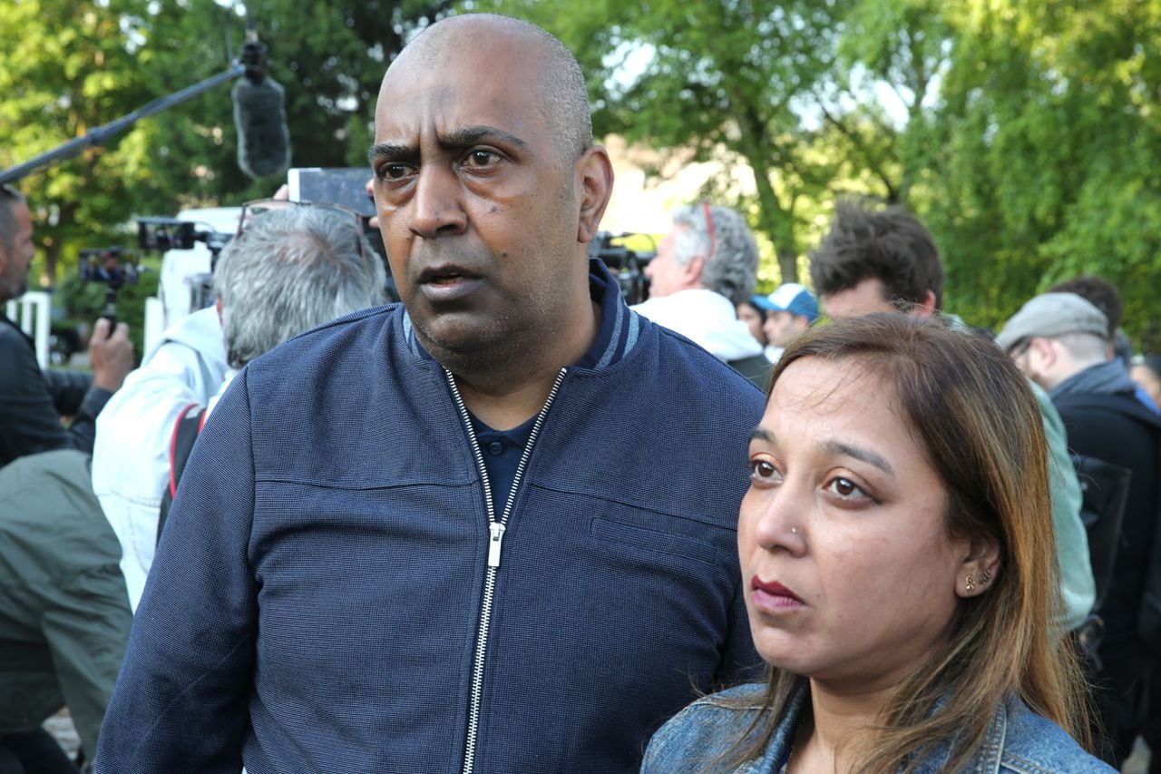 Shaina's parents arrive for the trial of the alleged murderer of their daughter, accused of murdering and burning alive the 15-year-old girl in 2019, at the Juvenile Assize Court of Beauvais, northern France, on June 5, 2023. (Photo by Fran�ois NASCIMBENI / AFP)