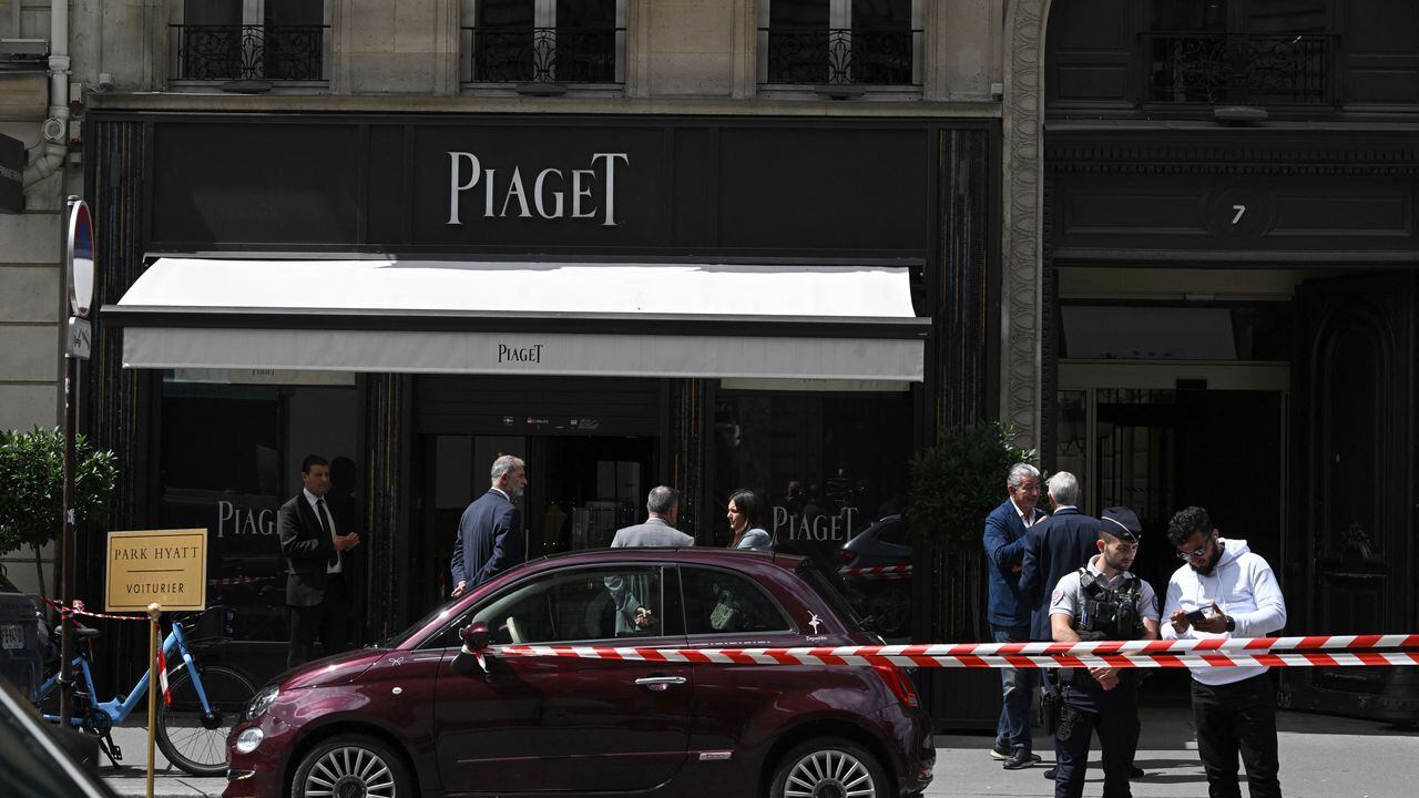 Red and white police tape cordons off the entrance of the French luxury Piaget jewellers store at Rue de la Paix that leads to Place Vendome, in Paris on August 1, 2023, following a robbery with losses estimated at �10-15 million according to the French police and the Paris public prosecutor's office. (Photo by STEFANO RELLANDINI / AFP)