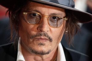 (FILES) US actor Johnny Depp arrives on the red carpet of the 47th Deauville US Film Festival in Deauville, western France, on September 5, 2021. Far from the media buzz around Ma�wenn and Johnny Depp, stars of "Jeanne du Barry" which opens the Cannes Film Festival on May 16, 2023, this film could not be more "academic, slow, classic", its director admits. (Photo by LOIC VENANCE / AFP)