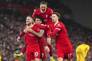 Liverpool's Alexis Mac Allister, left, celebrates with teammates after scoring his side's second goal during the English Premier League soccer match between Liverpool and Sheffield United at the Anfield stadium in Liverpool, England, Thursday, Apr. 4, 2024. (AP Photo/Jon Super)