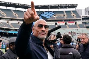 ARLINGTON, TEXAS - FEBRUARY 18: XFL owner gestures Dwayne Johnson gestures toward the stands before the game between the Arlington Renegades and the Vegas Vipers at Choctaw Stadium on February 18, 2023 in Arlington, Texas. (Photo by Sam Hodde/Getty Images)