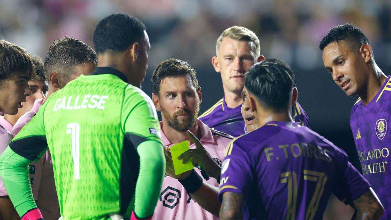 FORT LAUDERDALE, FLORIDA - AUGUST 02: Lionel Messi #10 of Inter Miami CF looks on as the referee hands out a yellow card during the Leagues Cup 2023 Round of 32 match between Orlando City SC and Inter Miami CF at DRV PNK Stadium on August 02, 2023 in Fort Lauderdale, Florida. (Photo by Mike Ehrmann/Getty Images)