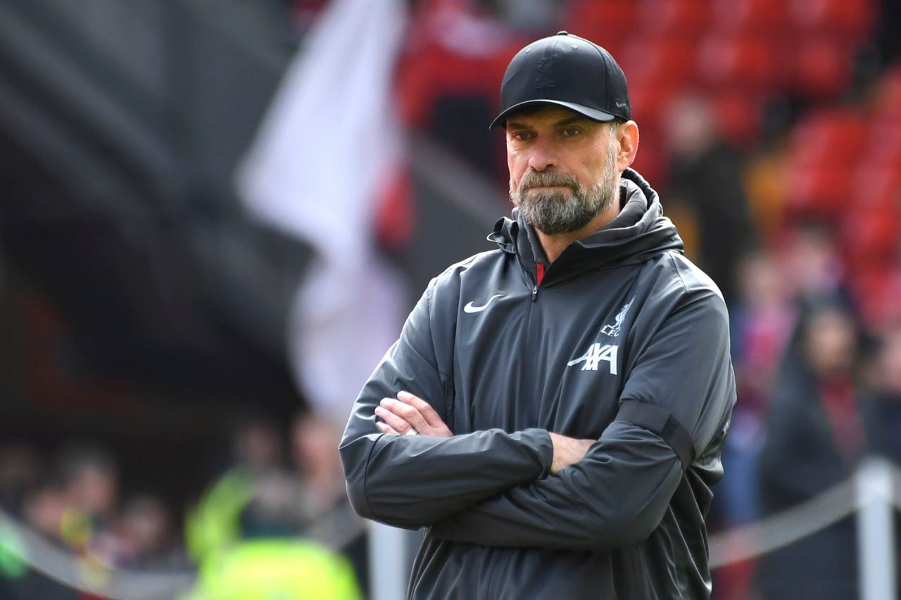 Liverpool's manager Jurgen Klopp watches his players prior to the English Premier League soccer match between Liverpool and Brighton and Hove at Anfield Stadium in Liverpool, England, Sunday, March 31, 2024. (AP Photo/Rui Vieira)