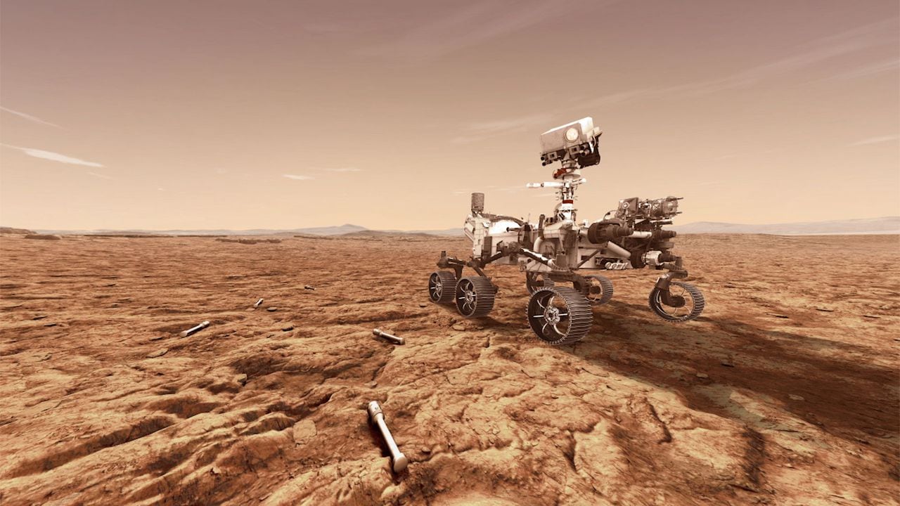 En esta ilustración conceptual provista por la NASA, el rover Perseverance (Mars 2020) de la NASA almacenará muestras de rocas y suelo en tubos sellados en la superficie del planeta para que futuras misiones las recuperen en el área conocida como cráter Jezero en el planeta Marte.