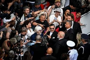 US actor Johnny Depp arrives for the opening ceremony and the screening of the film "Jeanne du Barry" during the 76th edition of the Cannes Film Festival in Cannes, southern France, on May 16, 2023. (Photo by Patricia DE MELO MOREIRA / AFP)