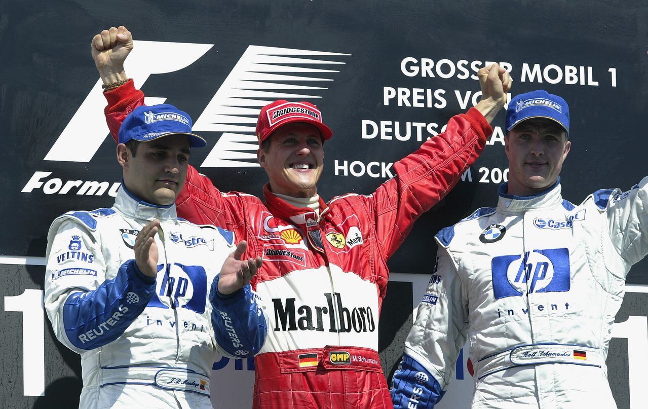 Juan Pablo Montoya, Michael Schumacher y Ralf Schumacher en el GP de Alemania (Hockenheim).