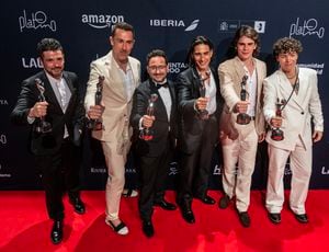 (From L) Andres Gil, Oriol Tarragon, Director Juan Antonio Bayona, Uruguayan actor Enzo Vogrincic, Felipe Gonzalez Otano and Argentinian actor Juan Caruso, who starred in the film "Society of the Snow", hold up their awards at the Platino Awards ceremony for Ibero-American cinema at Xcaret hotel in Playa del Carmen on April 20, 2024. The film won 6 awards at the ceremony in total. (Photo by CARL DE SOUZA / AFP)