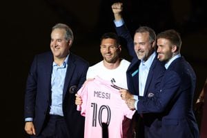 FORT LAUDERDALE, FLORIDA - JULY 16: (L-R) Managing Owner Jorge Mas, Lionel Messi, Co-Owner Jose Mas, and Co-Owner David Beckham pose during "The Unveil" introducing Lionel Messi hosted by Inter Miami CF at DRV PNK Stadium on July 16, 2023 in Fort Lauderdale, Florida. (Photo by Mike Ehrmann/Getty Images)