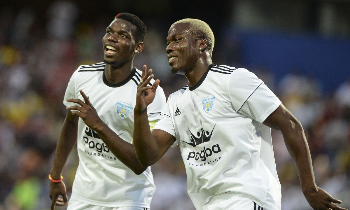 (FILES) In this file photo taken on June 25, 2017, Mathias Pogba (R) celebrates his goal with his brother Paul Pogba during a friendly match organized by the Juan Cuadrado foundation between the friends of Colombian midfielder Juan Cuadrado and of French midfielder Paul Pogba at Atanasio Girardot stadium, in Medellin, Antioquia department, Colombia. French police have opened an investigation into claims by World Cup winner Paul Pogba that he is the victim of a multi-million euro blackmail plot by gangsters involving his brother, a source close to the case told AFP on August 28, 2022. Pogba's allegations came after his brother Mathias published a bizarre video online -- in four languages (French, Italian, English and Spanish) -- promising "great revelations" about the Juventus star.
AFP/JOAQUIN SARMIENTO