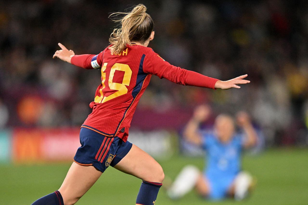 Spain's defender #19 Olga Carmona celebrates after scoring Spain's first goal during the Australia and New Zealand 2023 Women's World Cup final football match between Spain and England at Stadium Australia in Sydney on August 20, 2023. (Photo by Izhar KHAN / AFP)