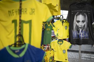 Merchandise of US pop star Madonna is offered at a shop of the traditional Uruguaiana street in Rio de Janeiro on April 29, 2024. Madonna will perform a free mega-concert on May 4 on Rio de Janeiro's Copacabana beach to close her 'Celebration' tour. (Photo by Pablo PORCIUNCULA / AFP)