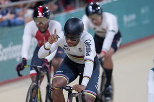 Colombia's Kevin Quintero celebrates winning the gold medal in the cycling track men's keirin final at the Pan American Games in Santiago, Chile, Friday, Oct. 27, 2023. (AP Photo/Fernando Vergara)