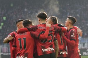 AC Milan players celebrate after AC Milan's Noah Okafor scored his side's third goal during a Serie A soccer match between AC Milan and Monza, at the San Siro stadium in Milan, Italy, Sunday, Dec. 17, 2023. (AP Photo/Luca Bruno)