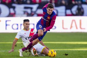 Barcelona's Andreas Christensen, front, duels for the ball with Rayo's Radamel Falcao during a Spanish La Liga soccer match between Rayo Vallecano and Barcelona at the Vallecas stadium in Madrid, Spain, Saturday, Nov. 25, 2023. (AP Photo/Jose Breton)