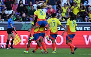 las jugadoras de la Selección Colombia festejan el gol anotado por Catalina Usme, con el que vencieron a México en un partido amistoso en Estados Unidos. /Foto CHANDAN KHANNA / AFP)