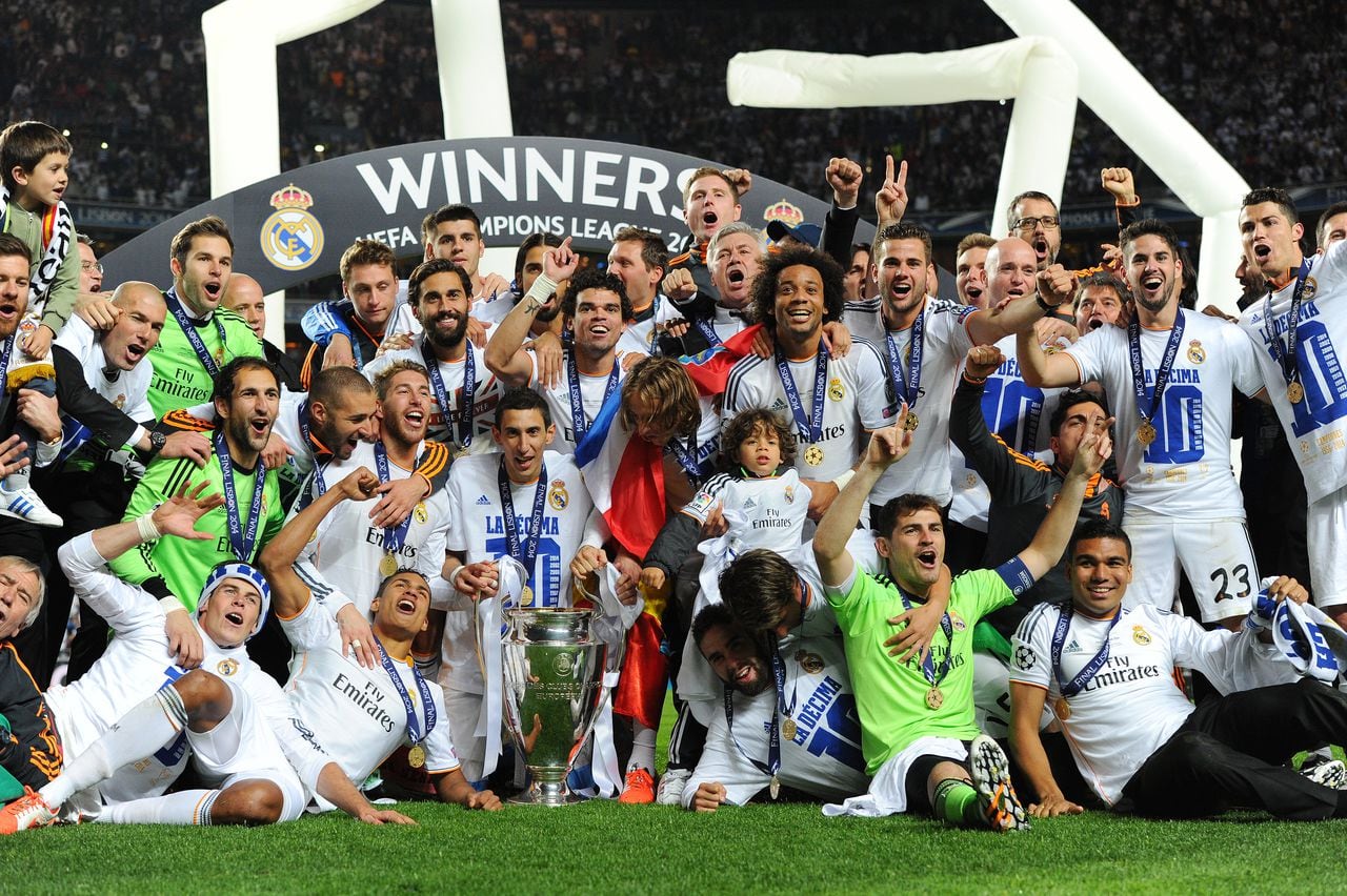 Real Madrid campeón de la Champions 2014. En la imagen, Di María sostiene el trofeo y al costado derecho se ve a Cristiano Ronaldo
