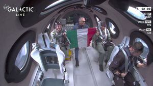 This still image from a Virgin Galactic video shows Galactic 01 mission crew members from the Italian Air Force display the Italian flag as they reach space during the first commercial flight from Spaceport City in New Mexico on June 29, 2023. Virgin Galactic on June 29 began commercial spaceflights, a major milestone for the company founded in 2004 by British billionaire Richard Branson. Its first paying customers are a three-member crew from the Italian Air Force and National Research Council of Italy, with a fourth seat occupied by a Virgin Galactic astronaut instructor. (Photo by Handout / Virgin Galactic / AFP) / RESTRICTED TO EDITORIAL USE - MANDATORY CREDIT "AFP PHOTO / Virgin Galactic" - NO MARKETING NO ADVERTISING CAMPAIGNS - DISTRIBUTED AS A SERVICE TO CLIENTS