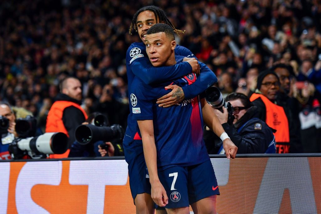 PARIS, FRANCE - FEBRUARY 14: Kylian Mbappe of PSG celebrates after scoring his team's first goal during the UEFA Champions League 2023/24 round of 16 first leg match between Paris Saint-Germain and Real Sociedad at Parc des Princes on February 14, 2024 in Paris, France. (Photo by Franco Arland/Getty Images)