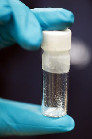 FILE - A vial containing 2mg of fentanyl, is displayed at the Drug Enforcement Administration (DEA) Special Testing and Research Laboratory in Sterling, Va., Aug. 9, 2016. The US is announcing a series of indictments and sanctions against 14 people and 14 firms across China and Canada related to the import of fentanyl into the United States. It's one of the biggest actions the Biden administration has taken against the trafficking of the deadly drug. (AP Photo/Cliff Owen, File)