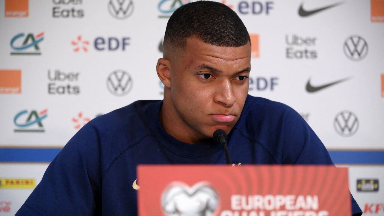 France's forward Kylian Mbappe grimaces during a press conference at the Algarve stadium, in Faro on June 15, 2023, on the eve of their UEFA Euro 2024 group B qualification football match against Gibraltar. (Photo by FRANCK FIFE / AFP)