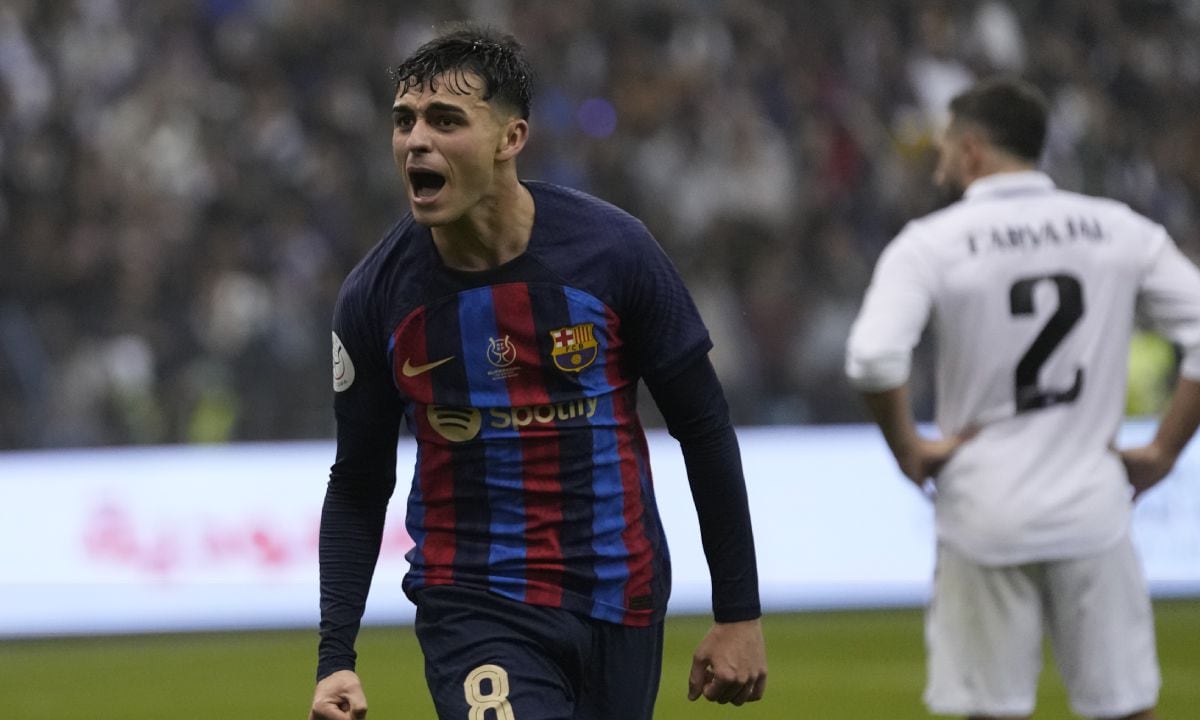 Barcelona's Pedri celebrates after he scored during the final of the Spanish Super Cup between Barcelona and Real Madrid in Riyadh, Saudi Arabia, Sunday, Jan. 16, 2023. (AP/Hussein Malla)
