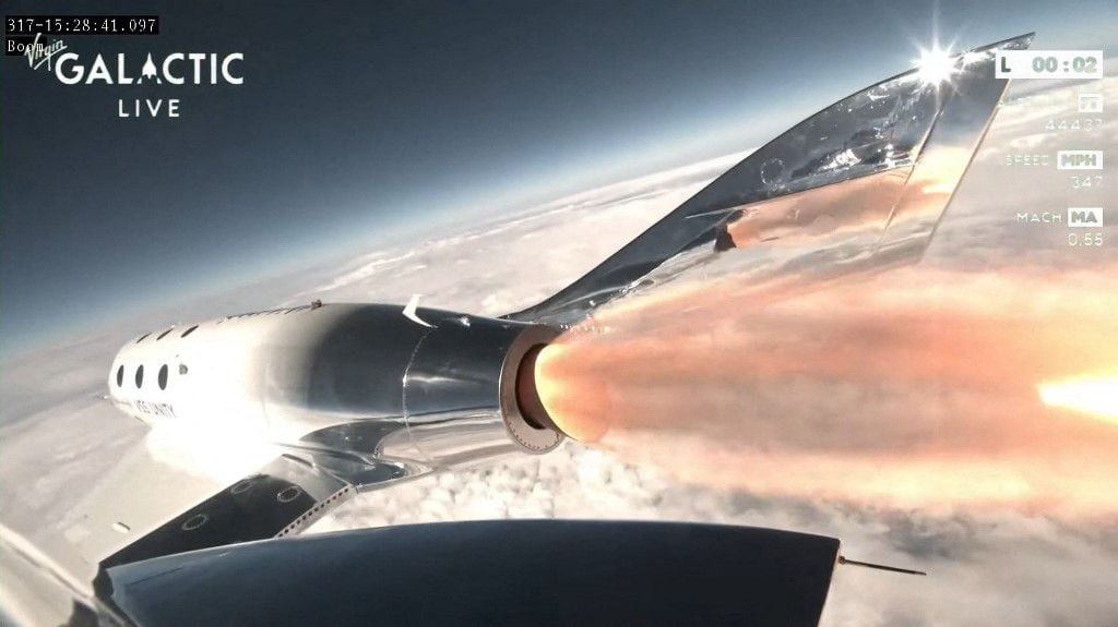 This still image from a Virgin Galactic video shows the Galactic 01 mission spacecraft launching the first commercial flight from Spaceport City in New Mexico on June 29, 2023. Virgin Galactic on June 29 began commercial spaceflights, a major milestone for the company founded in 2004 by British billionaire Richard Branson. Its first paying customers are a three-member crew from the Italian Air Force and National Research Council of Italy, with a fourth seat occupied by a Virgin Galactic astronaut instructor. (Photo by Handout / Virgin Galactic / AFP) / RESTRICTED TO EDITORIAL USE - MANDATORY CREDIT "AFP PHOTO / Virgin Galactic" - NO MARKETING NO ADVERTISING CAMPAIGNS - DISTRIBUTED AS A SERVICE TO CLIENTS