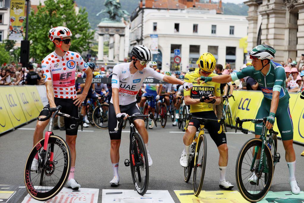 CLERMONT-FERRAND, FRANCE - JULY 12: (L-R) Neilson Powless of The United States and Team EF Education-EasyPost - Polka Dot Mountain Jersey, Tadej Pogacar of Slovenia and UAE Team Emirates - White Best Young Rider Jersey, Jonas Vingegaard of Denmark and Team Jumbo-Visma - Yellow Leader Jersey and Jasper Philipsen of Belgium and Team Alpecin-Deceuninck - Green Points Jersey prior to the stage eleven of the 110th Tour de France 2023 a 179.8km from Clermont-Ferrand to Moulins / #UCIWT / on July 12, 2023 in Clermont-Ferrand, France. (Photo by Michael Steele/Getty Images)
