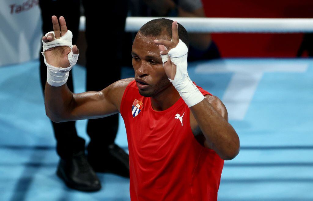 TOKYO, JAPAN - AUGUST 01: Lazaro Alvarez of Team Cuba reacts during the Men's Feather (52-57kg) quarter final on day nine of the Tokyo 2020 Olympic Games at Kokugikan Arena on August 01, 2021 in Tokyo, Japan. (Photo by Buda Mendes/Getty Images)