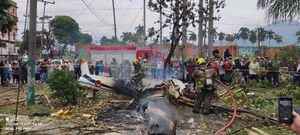 Accidente de avioneta de la FAC en Cali. Foto: Jorge Orozco / El País