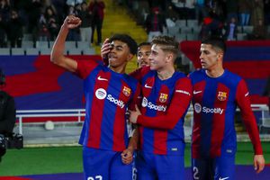 Barcelona's Lamine Yamal, left, celebrates with teammates after scoring his side's opening goal during a Spanish La Liga soccer match between Barcelona and Mallorca at the Olimpic Lluis Companys stadium in Barcelona, Spain, Friday, March 8, 2024. (AP Photo/Joan Monfort)