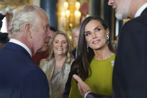 Britain's King Charles III, left, speaks to King Felipe VI and Queen Letizia of Spain, during a reception at Buckingham Palace, in London, Friday May 5, 2023 for overseas guests attending his coronation. (Jacob King/Pool Photo via AP)