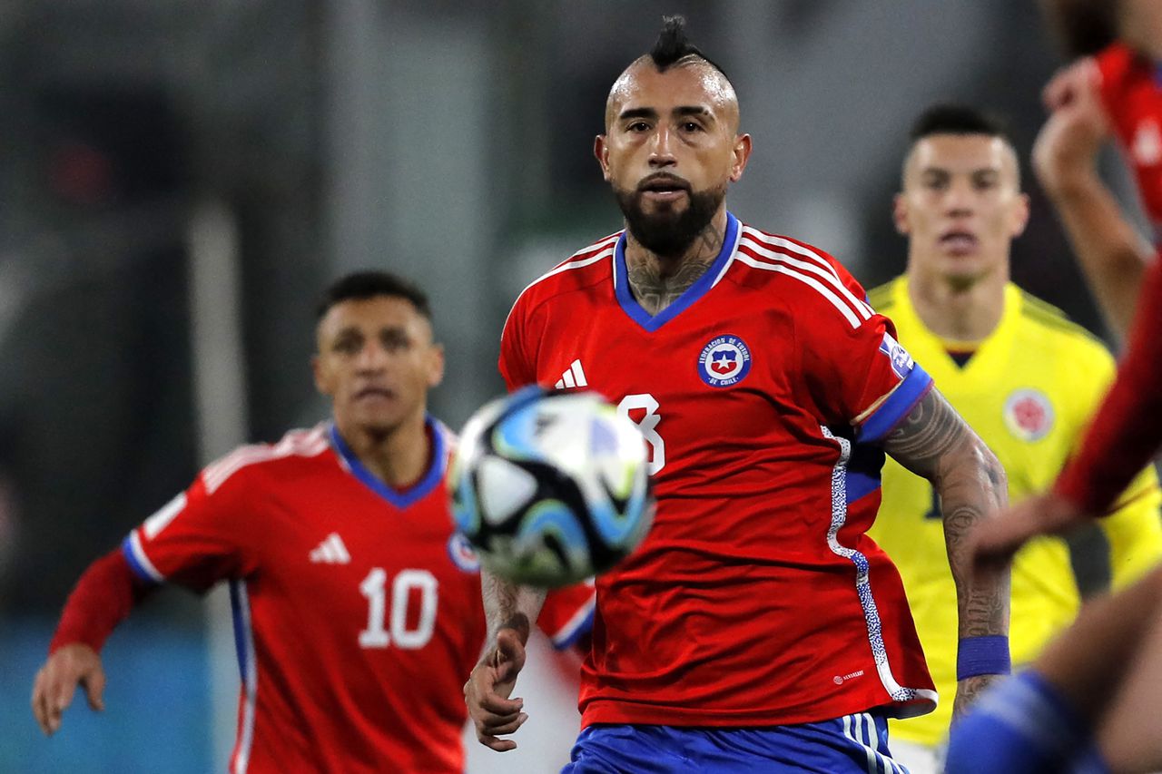 Chile's midfielder Arturo Vidal eyes the ball during the 2026 FIFA World Cup South American qualifiers football match between Chile and Colombia, at the David Arellano Monumental stadium, in Santiago, on September 12, 2023. (Photo by Javier TORRES / AFP)
