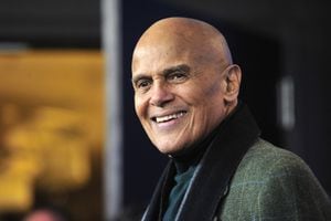 (FILES) In this file photo taken on February 12, 2011 US singer Harry Belafonte poses during a photocall for photographers for his movie "Sing Your Song" by director Susanne Rostock in Berlin on the third day of the international Berlinale film festival. - Harry Belafonte, the superstar entertainer who introduced a Caribbean flair to mainstream US music and became well known for his deep personal investment in civil rights, died on April 25, 2023 in Manhattan, US media reported. He was 96. (Photo by John MACDOUGALL / AFP)