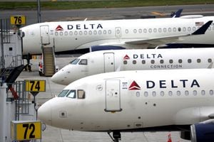 FILE PHOTO: Delta Airlines passenger jets are pictured outside the newly completed 1.3 million-square foot $4 billion Delta Airlines Terminal C at LaGuardia Airport in the Queens borough of New York City, New York, U.S., June 1, 2022. REUTERS/Mike Segar/File Photo