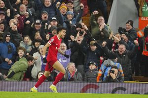 Liverpool's Luis Diaz celebrates after scoring his side's fourth goal during the English Premier League soccer match between Liverpool and Chelsea, at Anfield Stadium, Liverpool, England, Wednesday, Jan.31, 2024. (AP Photo/Jon Super)