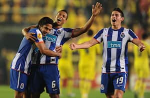 (FromL) FC Porto's Colombian forward Radamel Falcao, FC Porto's colombian midfielder Fredy Guarin and FC Porto's colombian forward James Rodriguez celebrate after the UEFA Europa League semi-final second leg football match between Villarreal and Porto at the Madrigal Stadium in Villarreal on May 5, 2011. Villarreal won the match 3-2, but Porto will play the final against SC Braga. AFP PHOTO / JOSE JORDAN (Photo by JOSE JORDAN / AFP)