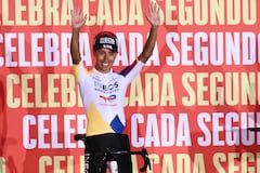 Team Ineos' Colombian rider Egan Bernal waves during the official teams presentation of the 80th edition of 'La Vuelta' cycling tour of Spain, in Torino, Italy on August 21, 2025. (Photo by Marco BERTORELLO / AFP)